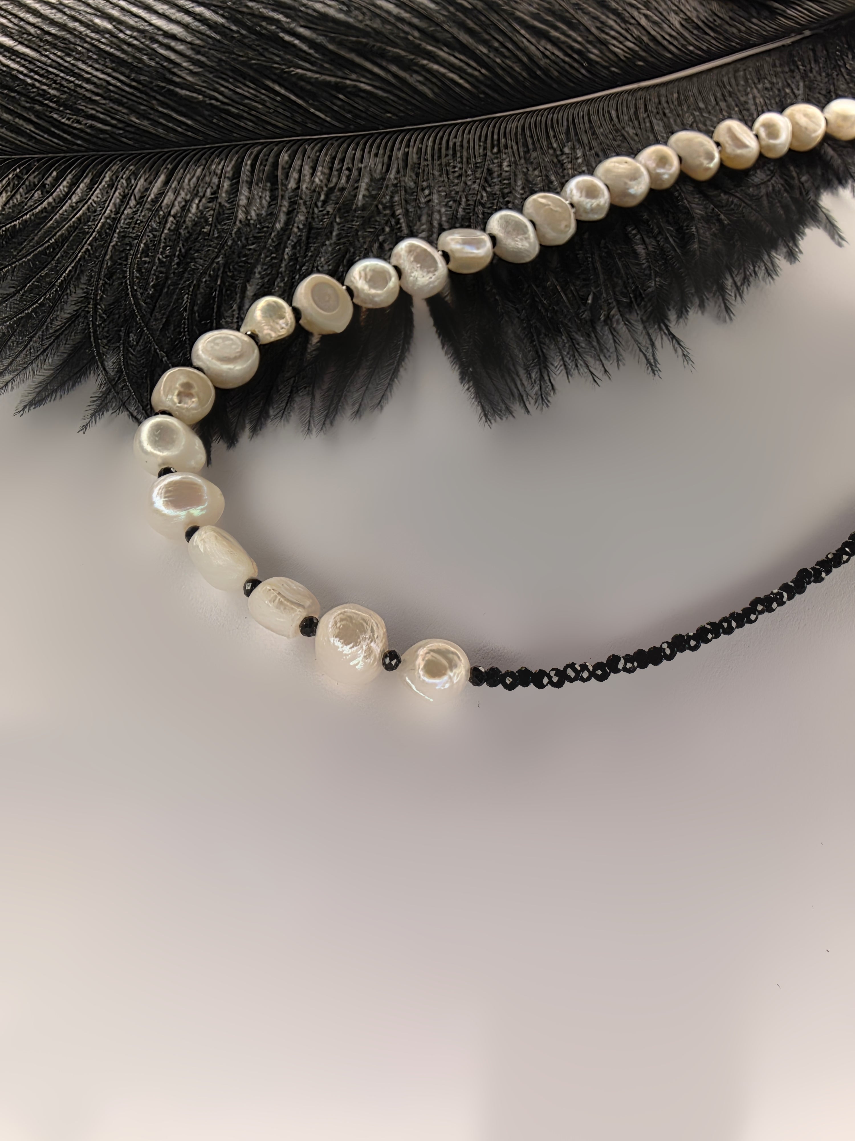 Juodojo švytėjimo perlai